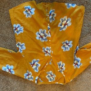 Yellow button down top with flowers. Size M.